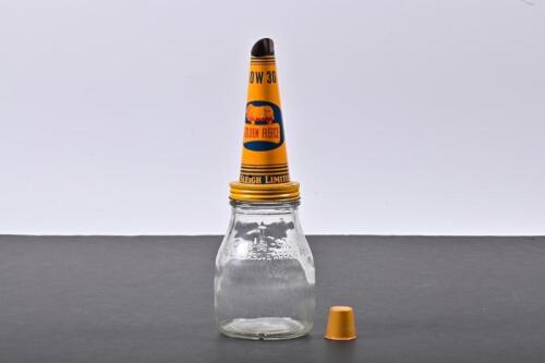 GOLDEN FLEECE: An early 1960s one imperial pint glass oil bottle with NOS Golden Fleece 10W 30 tin oil pourer and dust cap
