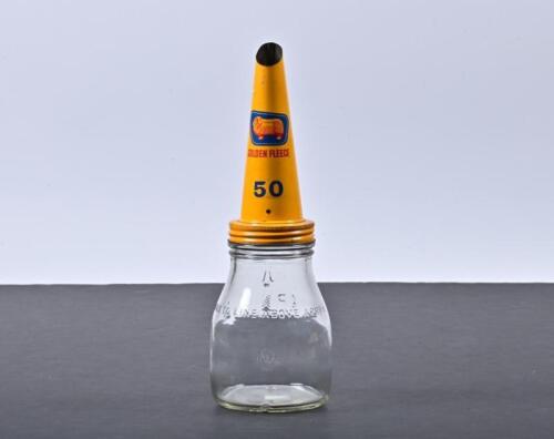 GOLDEN FLEECE: A 1960s one pint glass oil bottle with NOS Golden Fleece 50 tin oil pourer