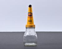 GOLDEN FLEECE: A 1960s one pint glass oil bottle with NOS Golden Fleece 50 tin oil pourer