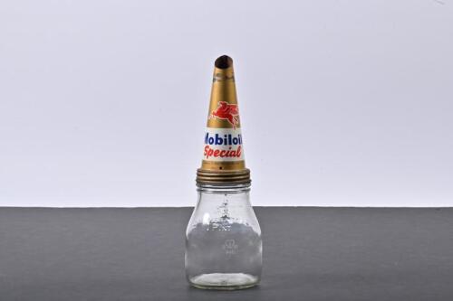 MOBIL: A one pint glass oil bottle with Mobiloil Special tin oil pourer