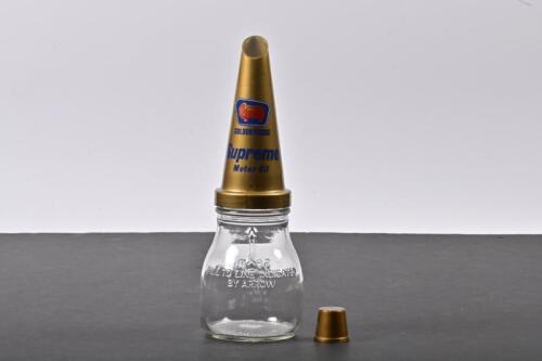 GOLDEN FLEECE: A five hundred millilitre oil bottle with NOS plastic Golden Fleece Supreme Motor Oil pourer