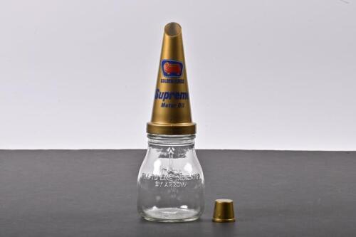 GOLDEN FLEECE: A five hundred millilitre oil bottle with NOS plastic Golden Fleece Supreme Motor Oil pourer