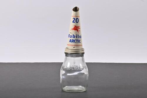 MOBIL: A one pint glass oil bottle with NOS Mobiloil Arctic 20 tin oil pourer