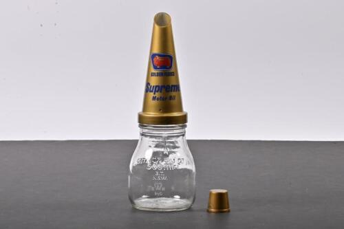 GOLDEN FLEECE: A five hundred millilitre oil bottle with NOS plastic Golden Fleece Supreme Motor Oil pourer