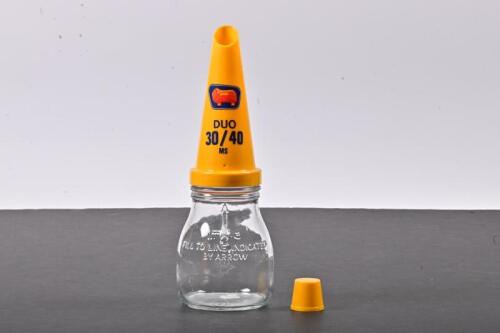GOLDEN FLEECE: A five hundred millilitre oil bottle with NOS plastic Golden Fleece 30/40 pourer