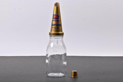 GOLDEN FLEECE: A one litre oil bottle with NOS plastic Golden Fleece Supreme Motor Oil pourer