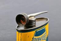 GOLDEN FLEECE: An early four fluid ounce Golden Fleece Home Lubricant tin - 4