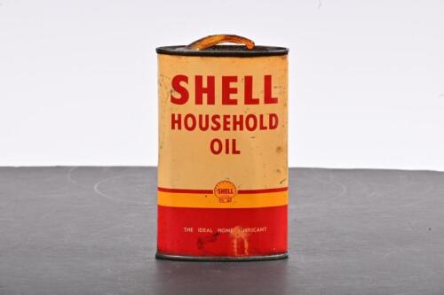 SHELL: An eight fluid ounce Shell Household Oil tin