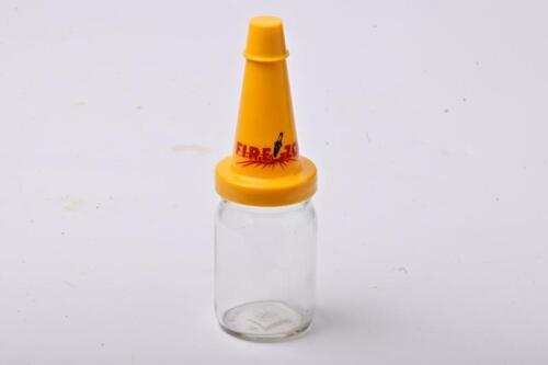 FIREZONE: A large NOS Firezone oil bottle with plastic pourer and cap