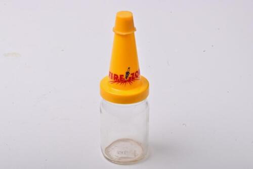 FIREZONE: A large NOS Firezone oil bottle with plastic pourer and cap