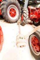 A Metal axle with wooden wheel hubs&nbsp;