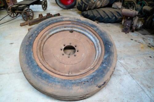 Two 8-stud tractor wheels of similar size