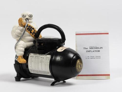 MICHELIN: A 1920s/1930s French metal Bibendum figural compressor produced by Michelin, 28cm high