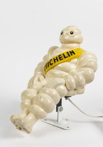 MICHELIN: A 1960s/1970s illuminated seated plastic figure of Bibendum as used on commercial vehicles (trucks), 30cm high