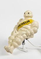 MICHELIN: A 1960s/1970s illuminated seated plastic figure of Bibendum as used on commercial vehicles (trucks), 30cm high