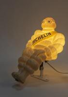 MICHELIN: A 1960s/1970s illuminated seated plastic figure of Bibendum as used on commercial vehicles (trucks), 30cm high - 2