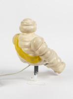MICHELIN: A 1960s/1970s illuminated seated plastic figure of Bibendum as used on commercial vehicles (trucks), 30cm high - 3
