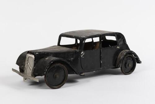 CITROEN: A lovely large 1940s period scratch built aluminium model of a Traction Avant, with sprung leaf suspension and active steering, wheels made from Henri Nestle tin lids, opening bonnets and doors, scatach dated to base, "9-45", 39cm long, 13cm high