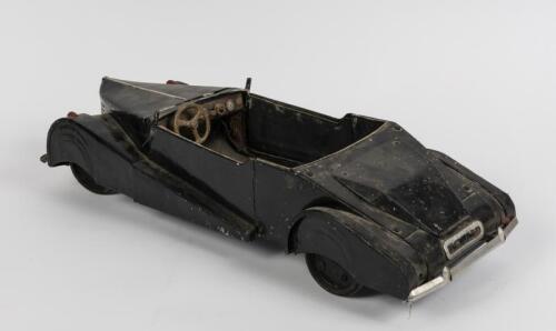GRAEME PAIGE: A circa 1941 large aluminium scratch Graham Paige model car, 52cm long, 11cm high