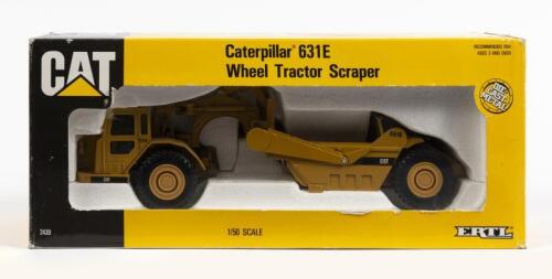 CATERPILLAR: A 1:50 scale Norscot CAT 631E wheel tractor scraper diecast model, NIB
