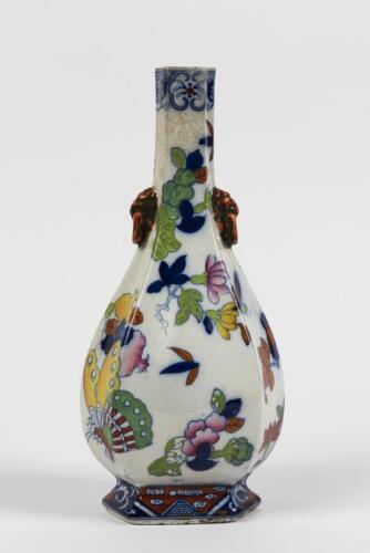 VASE: A Chinese multi faceted vase decorated with butterflies and foliate designs, six character mark to base, 25.5cm