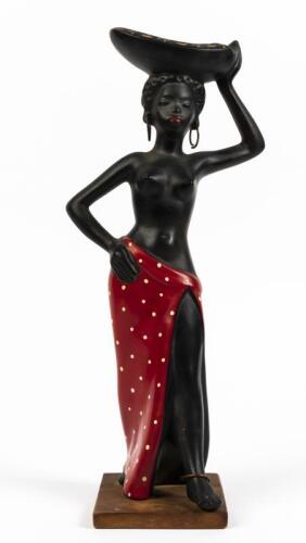 BARSONY: A 1950/60's Barsony ceramic female figure in a red skirt with a platter, signed to base: BARSONY, 37cm high