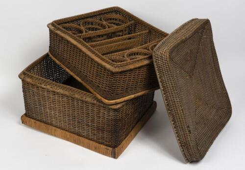PICNIC HAMPER: A wicker two piece picnic hamper, the top section with fitted compartments for two wine bottles and six glasses, 42cm high, 44cm wide, 36cm deep