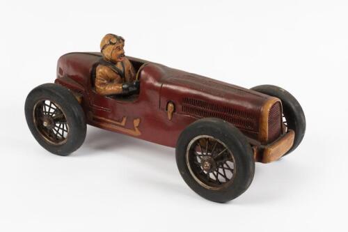 MODEL CAR: A large modern reproduction composite model of a early Grand Prix car and driver, 49cm long