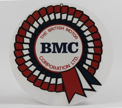 BMC: A circa 1980s BMC rosette sticker on translucent perspex, 39cm diameter overall