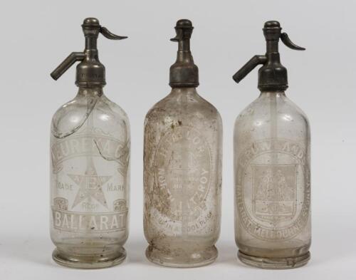 SODA SYPHONS: Three vintage soda syphons, one etched E Rowlands Ballarat , Melbourne & Sydney, one H Taylor North Fitzroy, and one Eureka Ballarat