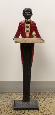 DOOR STOPPER: A tall cast metal reproduction door stopper/tip tray in the form of a waiter, 70cm high