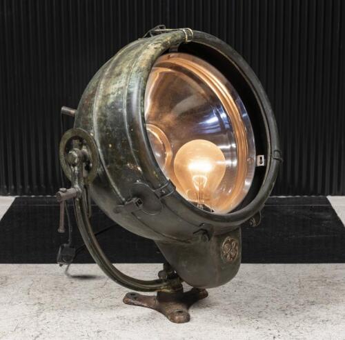 GENERAL ELECTRIC: A large circa 1930s GE copper spotlight, face diameter 37cm