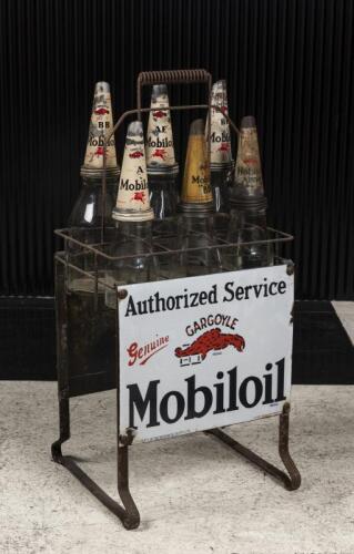MOBILOIL: A nice early double sided Mobil Oil 'Gargoyle' 6-bottle garage rack set with bottles and pourers