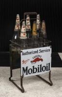 MOBILOIL: A nice early double sided Mobil Oil 'Gargoyle' 6-bottle garage rack set with bottles and pourers