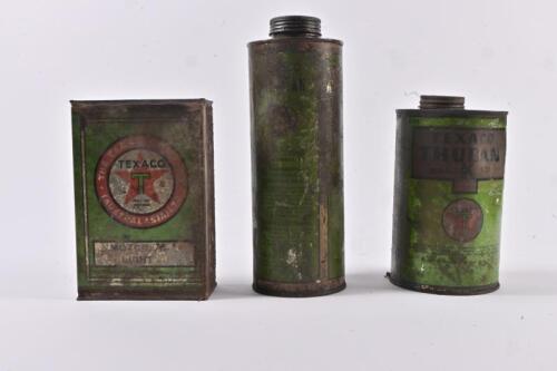 TEXACO: Three Texaco oil tins, various shapes and sizes, the tallest marked "The Texas Company (Australasia) Ltd"