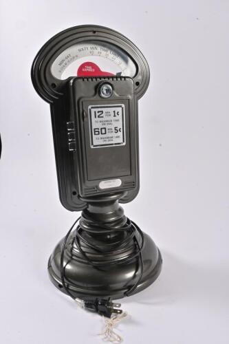 PARKING METER: A novelty plastic radio cassette player in the form of a parking meter, 43cm high