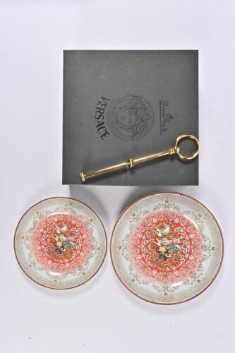 VERSACE/ROSENTHAL: A two tier cake stand with central handle, complete in box ready to assemble