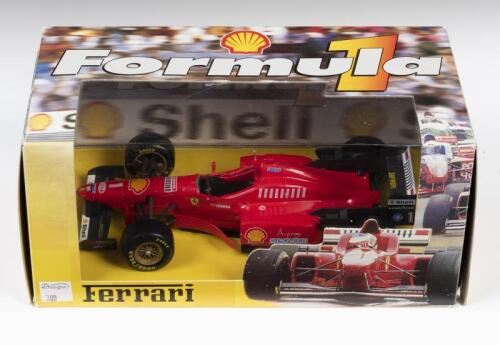 FERRARI: A 1:18 scale Maisto diecast model of a 1996 Ferrari F310 in Shell livery as driven by Michael Schumacher, in original box