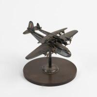 FLYING BOAT: A mid-20th century silver plate model of Short-Mayo composite aircraft on Bakelite base