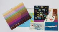 QANTAS: Two 1973 Qantas flight guides with insert menu, postcards and lapel pin to rear