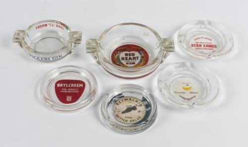 ASHTRAYS: A collection of six vintage promotional glass ashtrays including Red Heart Rum, Corio Whisky, Ezywalkin,VB and Brylcreem, largest 17cm across