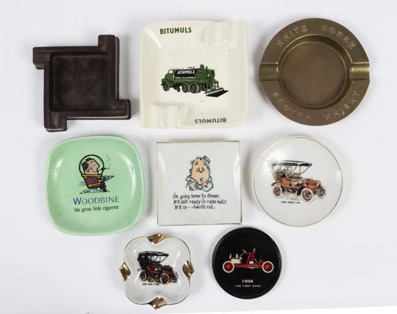 ASHTRAYS A collection of vintage ashtrays, including a Bakelite Dunlop