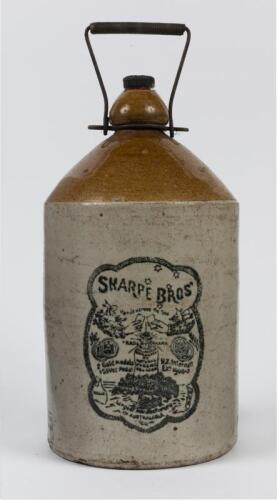 SHARPE BROS: A Sharpe Bros Hands across the Sea demijohn with stopper, 36cm high