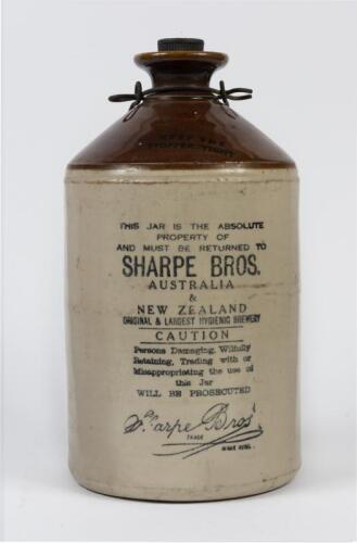 SHARPE BROS: A 1929 Sharpe Bros Australia and New Zealand demijohn with stopper, 34cm high
