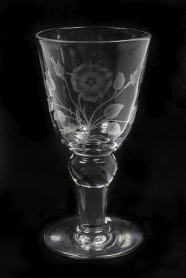 WINE GLASS: A large glass wine glass etched with folate and floral decoration, 28.5cm