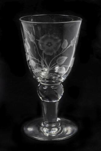 WINE GLASS: A large glass wine glass etched with folate and floral decoration, 28.5cm