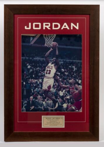 MICHAEL: JORDAN: A framed poster of Michael "Air" Jordan, "The Man Who Could Fly", 87 x 61cm overall