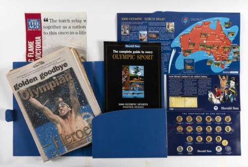 SYDNEY OLYMPICS: A collection of Herald Sun commemorative items from the Sydney Olympics 2000, comprising a Olympic Torch Relay pin album, Olympic gold medalist collection and plastic binder with newspapers during the games
