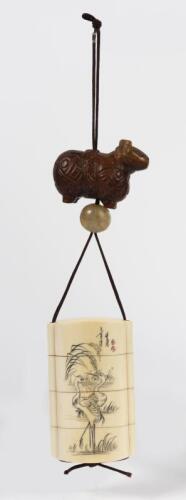 INRO: An ivory Inro with Tagua nut netsuke, the four section inro with scrimshaw waterbirds, with a tagua nut netsuke featuring stylised pig, signed, 7.5cm