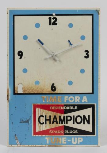 CHAMPION: A circa 1960s/1970s garage clock in hardened plastic with later battery movement, untested, 46cm high, 31cm wide
